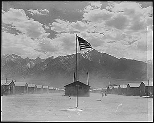 Dorothea Lange, [“Manzanar, California, Dust storm at this War Relocation Authority center where evacuees of Japanese ancestry are spending the duration” (July 3, 1942)]